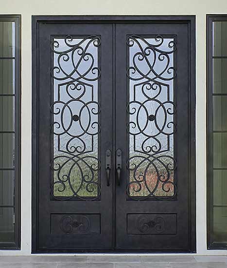 Custom double iron exterior entry, Mediterranean style, Flemish glass, Patented Thermal Break, hand-rubbed bronze finish