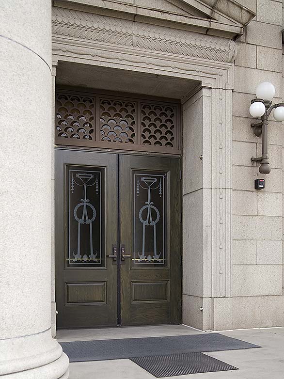 Double entry doors, Colorado Springs City Hall, custom etched glass, white oak, green stain, Historical Renovation Project