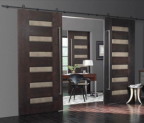 Pair of contemporary Walnut sliding barn doors with leather panel inserts